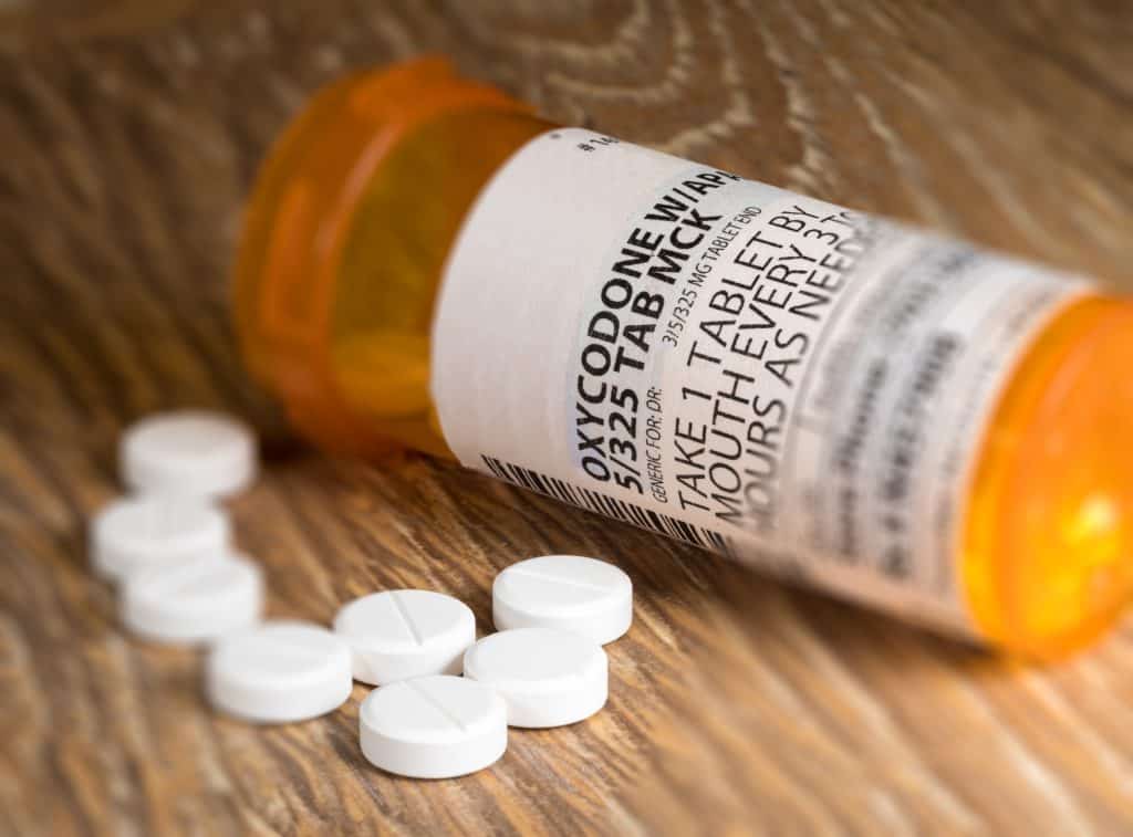 Macro of oxycodone opioid tablets dangers of improper medical waste management